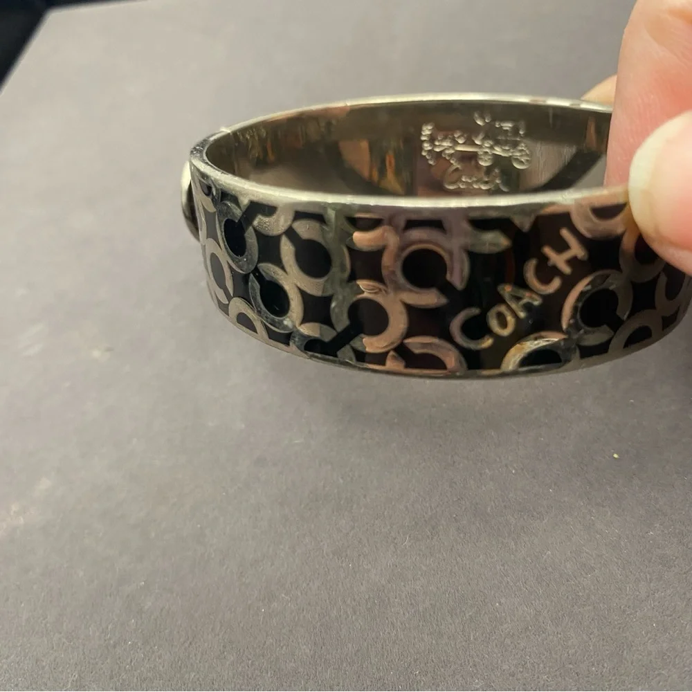 Coach Silver-Tone Black Logo Hinged Bangle Bracelet